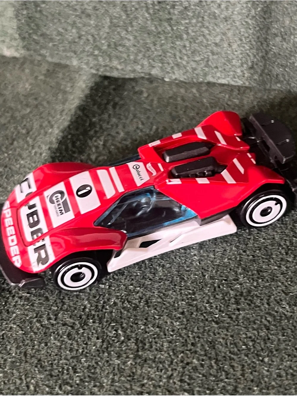 Red Assorted Brands of Die-Cast Racing Cars